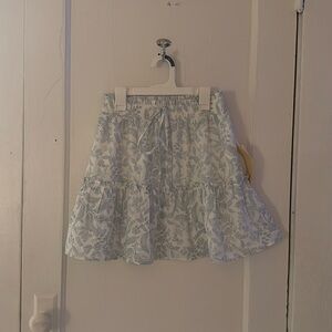 White and Blue mini skirt.